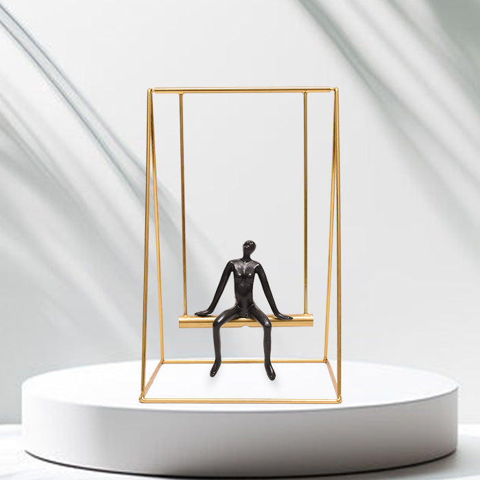 Large Golden Swing with Porcelain Object
